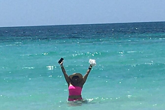 7 Mile Beach and Rick's Cafe Private Tour - Seven Mile Beach at Margaritaville, spend it your way