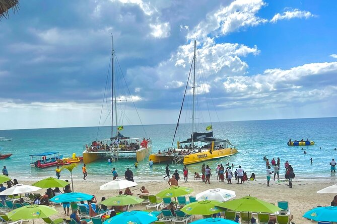7 Mile Beach Party Catamaran Cruise with Snorkeling & Ricks Cafe - Key things to know before you go