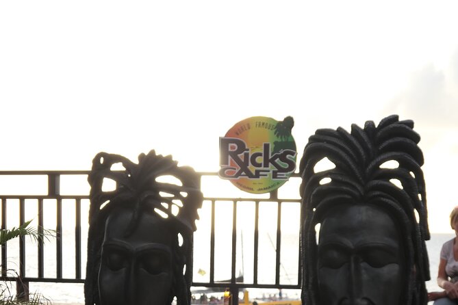 7 Mile Beach & Ricks Cafe with free Shopping experience - Rick’s Cafe: cliff jumpers, cocktails, and sunset viewing