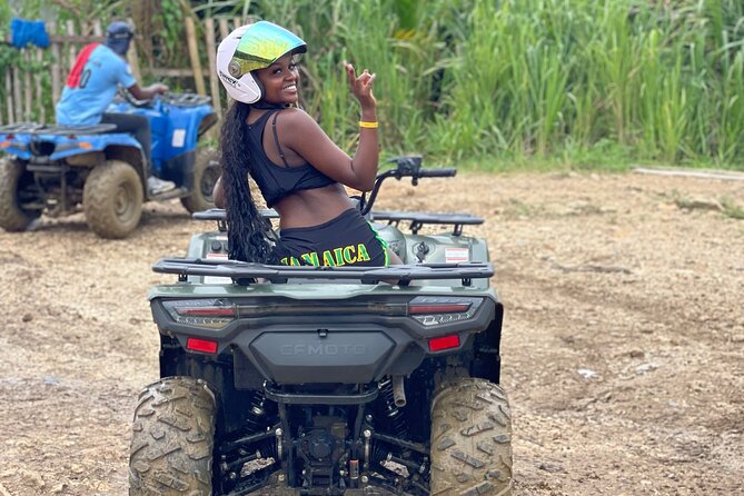 ATV and Bamboo Rafting With limestone foot massage and transport - Bamboo Rafting on Tranquil Water: The Calm Moment After the Ride