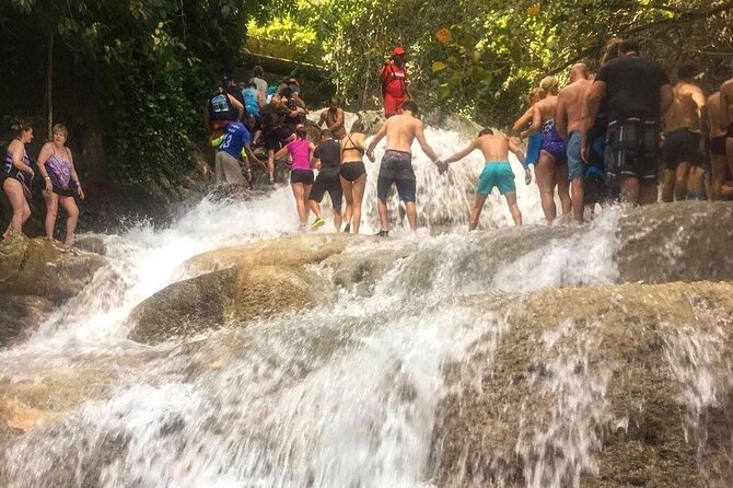 Bamboo Rafting, Dunn's River Falls and Horseback Riding Private Tour - Stop 1: Martha Brae rafting on a calm three-mile ride