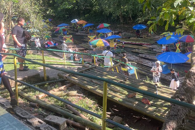 Bamboo Rafting with Limestone Foot massage then Margaritaville. - Bamboo rafts on the Great River, plus that 1820s bridge moment