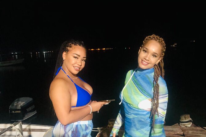 Bioluminescent Lagoon Tour: Night Swimming and Liming in Jamaica - The boat ride over glowing water