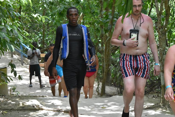 Blue Hole plus Secret Falls and Dunns River Falls Combo from Falmouth Hotels - Stop 2: Dunn’s River Falls, climb in a human chain