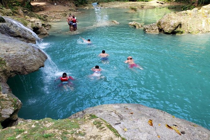 Blue Hole & Secret Falls Day-Trip with Shopping from Grand Palladium - Ocho Rios shopping street: souvenirs, rum, coffee, and the real deal on time