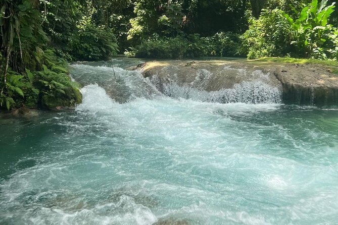 Blue Hole, Secret Falls & River Rapids Tubing from Montego Bay - Ocho Rios stop, where you get space to breathe