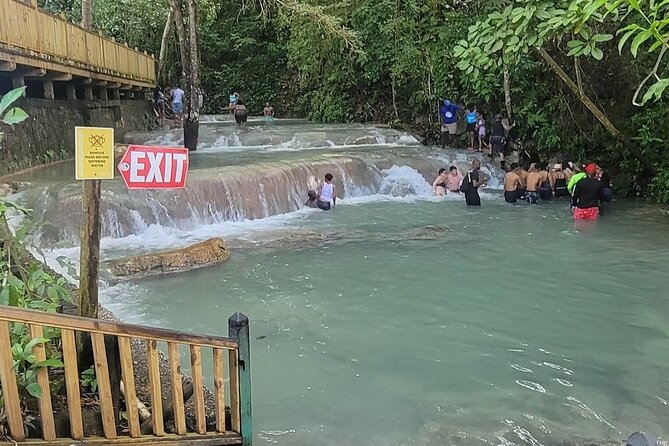 Blue Hole, Secret Falls & River Rapids Tubing from Montego Bay - Blue Hole sinkholes, rope swing time in fresh water