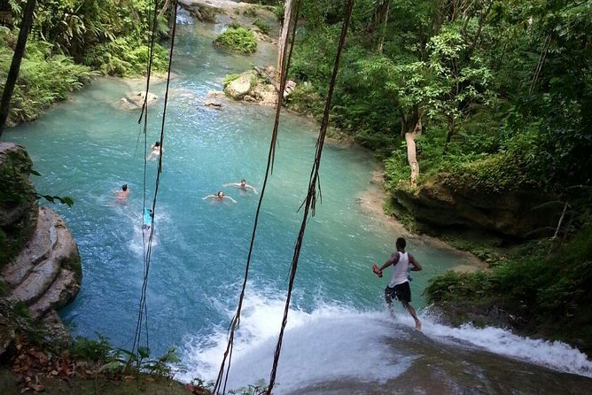 Blue Hole Waterfalls Tour from Falmouth - Stop 1: Blue Hole, rope swings, cave passages, and cliff jumps