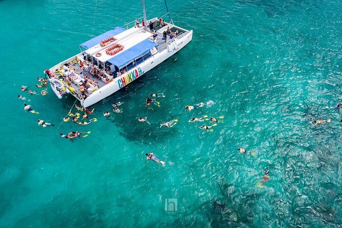 Catamaran Party Cruise and Snorkeling from Montego Bay - The boat portion: DJ energy, snacks, and unlimited drinks