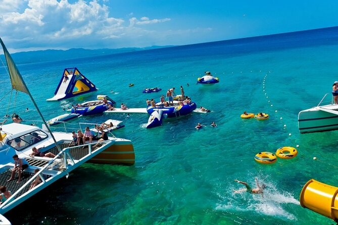 Catamaran Party Cruise and Snorkeling from Montego Bay - Snorkeling near Doctor’s Cave Beach: calm water, reef time, real gear