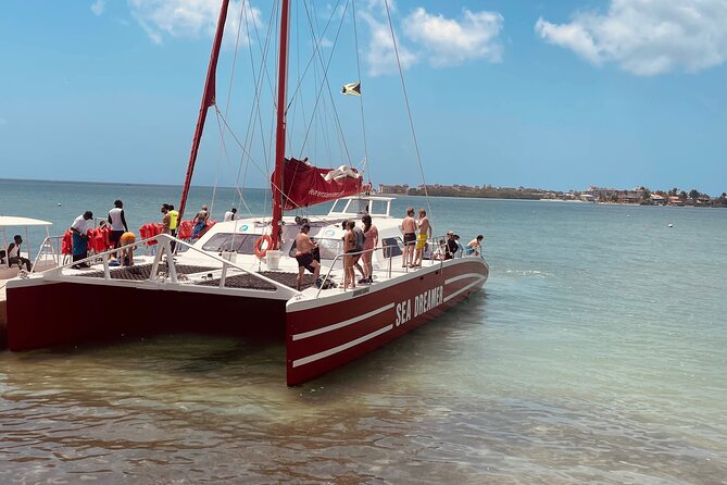 Catamaran Party Cruise and Snorkeling in Montego Bay - Getting to the boat: Bogue Road, pickup, and how the day starts
