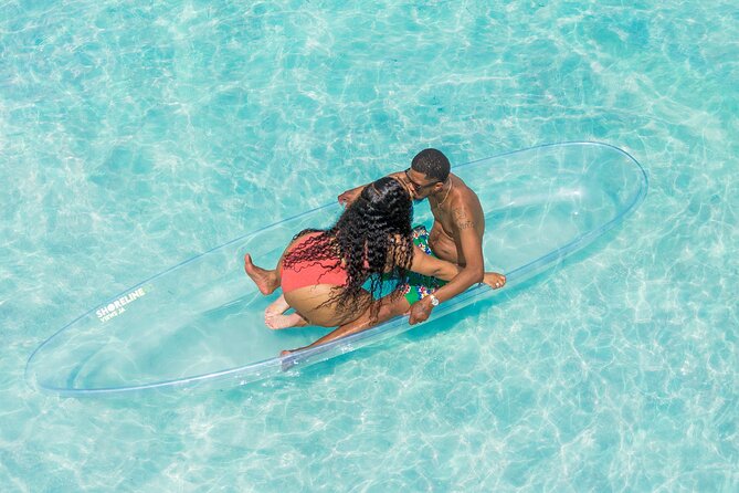 Clear Kayak Drone Photoshoot in Jamaica - Clear-bottom kayaking in Montego Bay, with the ocean in your lap