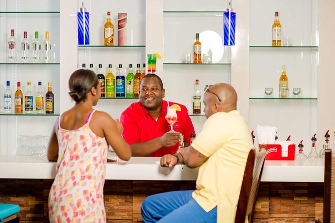 Departure Shuttle to Airport, Club Mobay Fast Track & VIP Lounge Combo - Shuttle Pickup in the Montego Bay and Negril Orbit