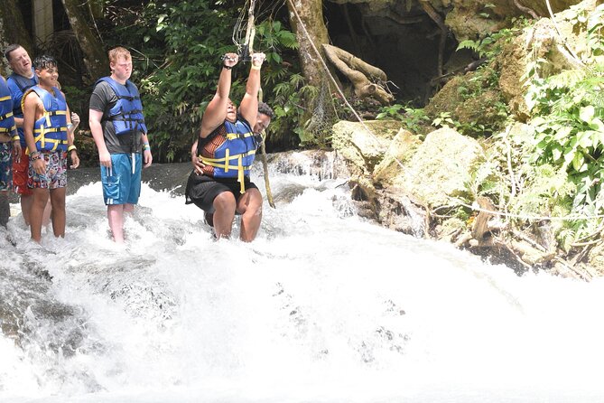 Dunn's River and Blue Hole with lunch combo from Montego Bay - Blue Hole: cliff jumping, rope swing energy, and lagoon swimming