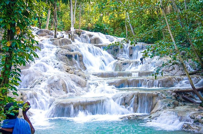 Dunn's River Falls, River Tubing, and Horseback Riding With Transportation - Dunns River Falls: the 180-foot climb and the terraced stair effect
