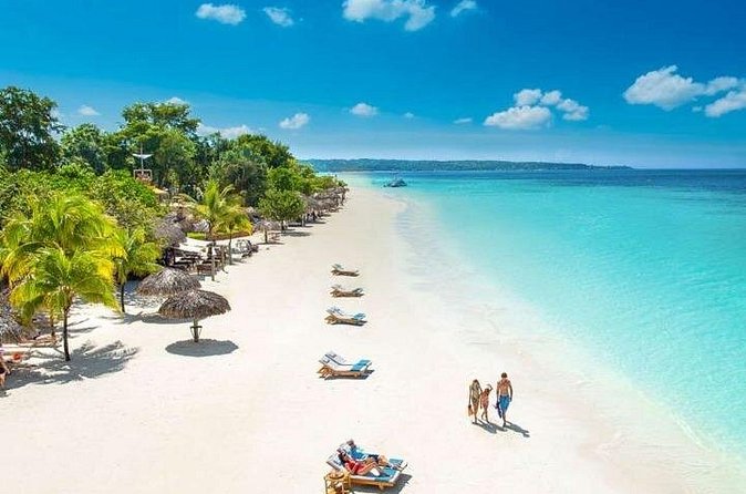 Experience Negril Seven Mile Beach & Jamaica's Famous Ricks Café - Rick’s Cafe Sunset: Reggae, Cocktails, and Cliff-Jump Entertainment