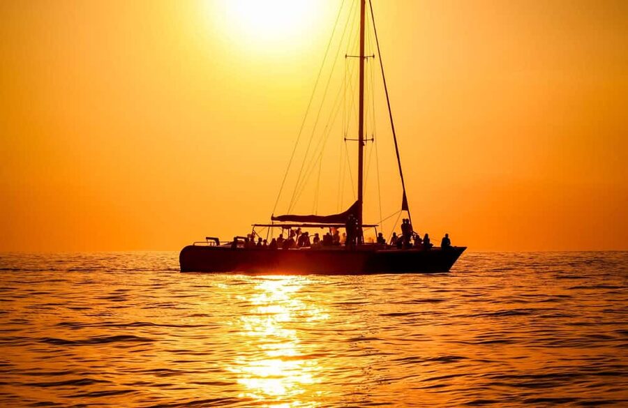 From Montego Bay/Falmouth: Negril Beach Catamaran Cruise - Ricks Cafe sunset stop and the cliff jump show