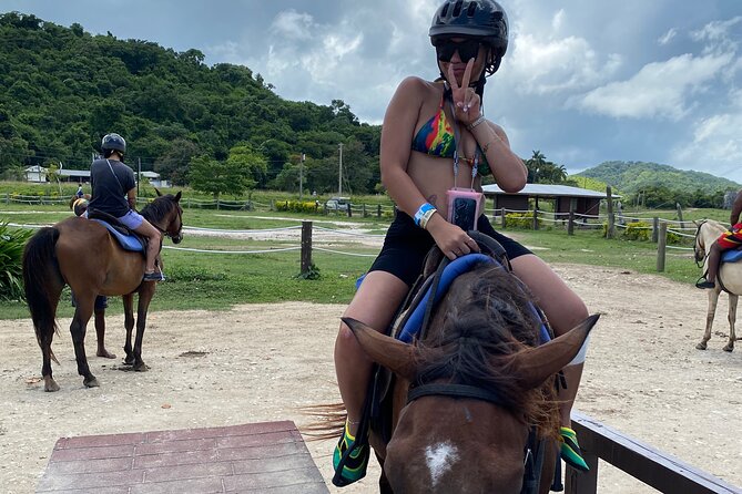 Great River Rafting Limestone Foot Massage and Horseback Rides From Montego Bay - Sandy Bay Horse Ride Into the Caribbean Sea