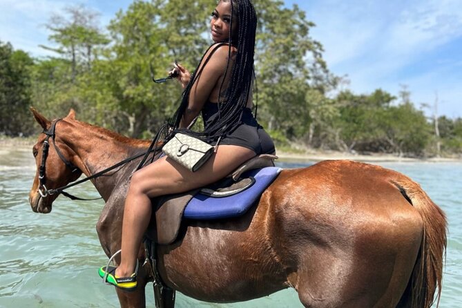 Horseback Ride , Dunns River Falls & Blue Hole From Montego Bay - The river rafting component, included but timed in the water theme