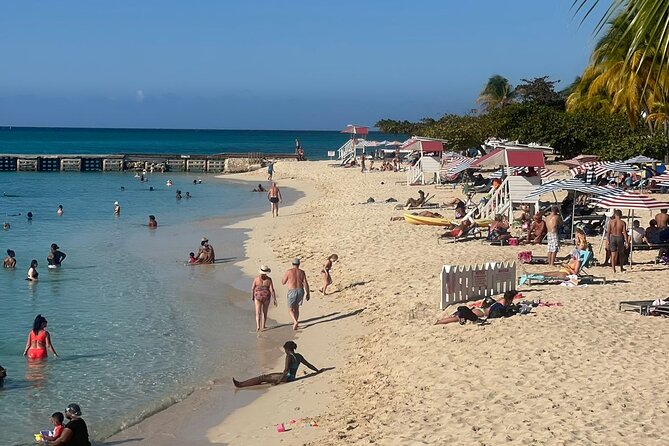 Jamaica Adventure: Bamboo Rafting, Negril Beach & Rick's Sunset - Rick’s Cafe Sunset, Food, and the Cliff-Jump Show
