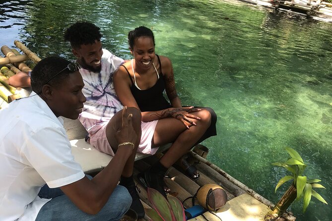 Jamaica Bamboo Rafting Tour Limestone Foot Massage - Arriving at the Martha Brae area: life jacket, photos, and your captain