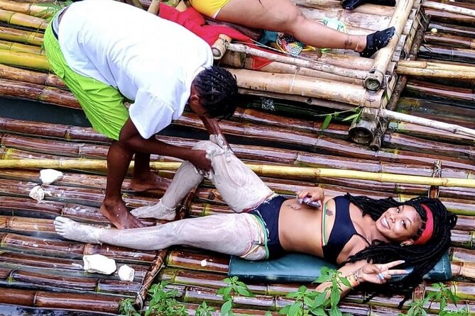 Jamaica Bamboo River Rafting Experience with Lime Stone Massage - Mid-ride limestone massage: traditional exfoliation with a hands-on feel