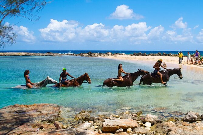 Martha Brae Rafting, Horseback Riding and Luminous Lagoon - Triple Treat - Martha Brae rafting village: the one-hour river ride you will remember