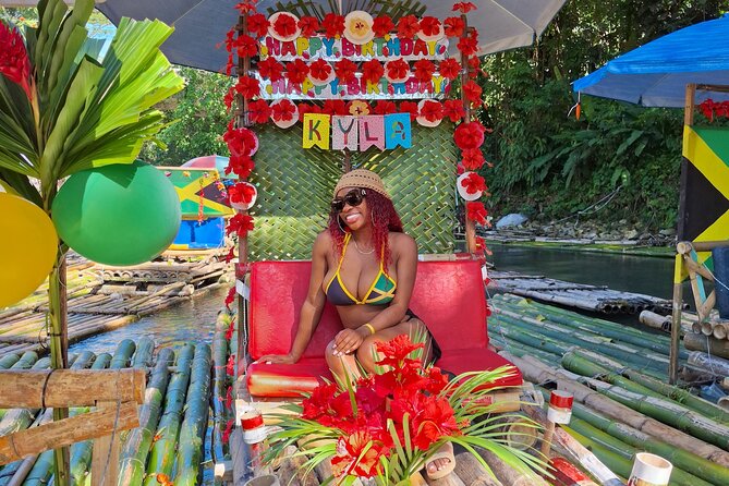 Montego Bay: Bamboo Rafting with Limestone Massage & Shopping - Downstream on a bamboo raft: captain, music, and swim time