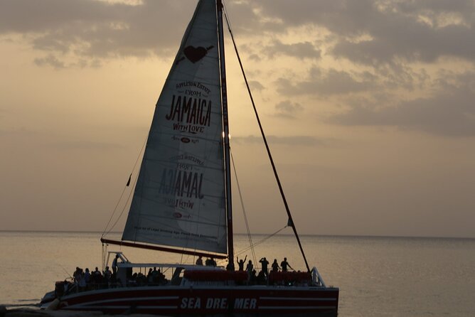 Montego Bay Catamaran: Snorkel Tour with Open Bar & Reggae DJ - Reggae DJ, crew energy, and the dance lesson you might actually enjoy