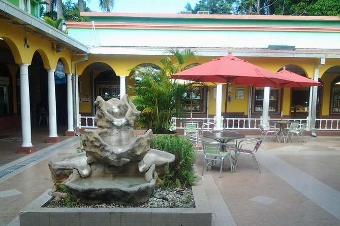 Montego Bay Excursion Negril 7 Miles Beach, Rick's Cafe and Time Square Shopping - Rick’s Cafe: cliff-jumping action and reggae energy