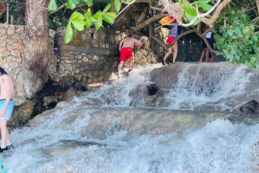 Montego Bay: Private Dunn's River Falls and Blue Hole Tour - Dunn’s River Falls climb: the famous 600-foot stretch, guided