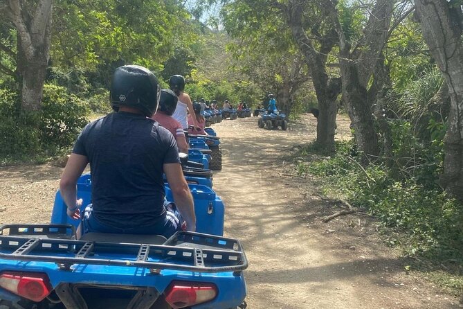 Negril Private Day Tour: ATV Ride, Party Catamaran & Ricks Cafe - Rick’s Cafe sunset-style experience with cliff diving and live music