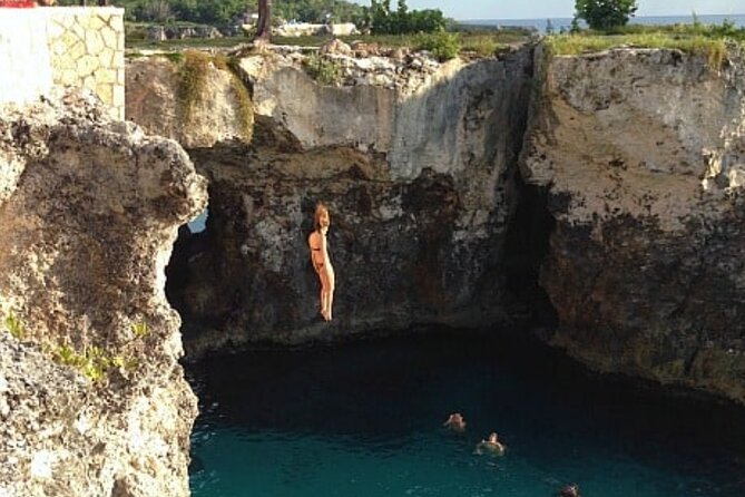 Negril Seven Mile beach and Rick’s Cafe from Montego Bay - Stop 1: Seven Mile Beach time, swimming, and water-sport choices