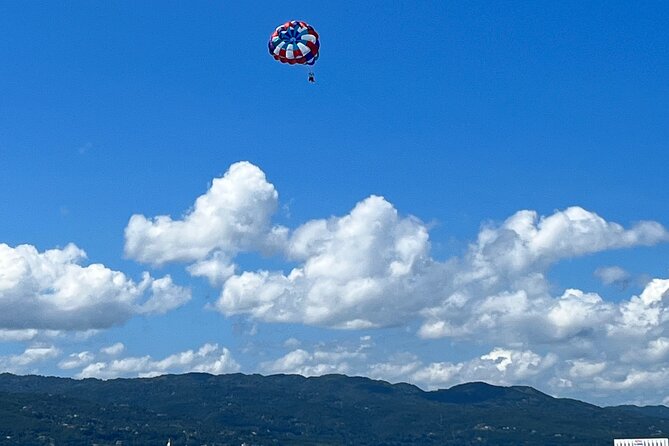 Parasailing above Turquoise Ocean Waters in Montego Bay - After You Come Down: Turning the Landing Into Real Beach Time