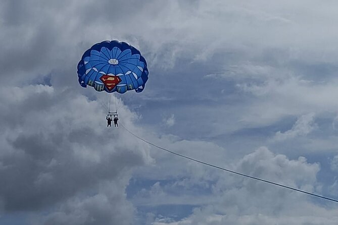 Parasailing, Blue Hole Mineral Spring, Seven Mile Beach - Seven Mile Beach: Where the Day Finds Its Beach Rhythm