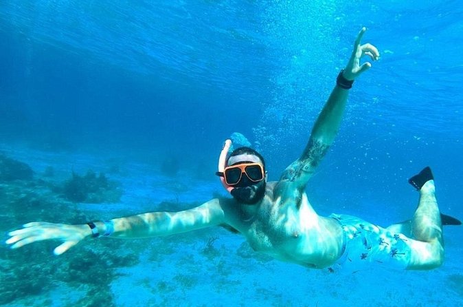 Party Catamaran Cruise with Open Bar and Snorkeling Montego Bay - Montego Bay Coast Views and the Fun Stops That Make It Memorable