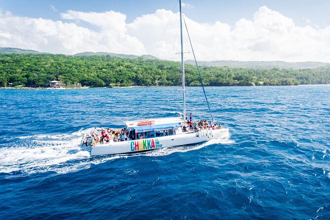 Party Catamaran with Dunns River Climb from Montego Bay - Chukka Island Village stop: coffee tasting, film, and quick decisions