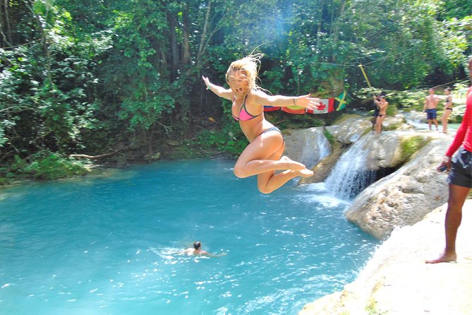 Private Blue Hole & Secret Falls Day Trip plus Shopping from Montego Bay Hotels - Blue Hole mineral pool time: rock jumps, Tarzan ropes, and cave swimming