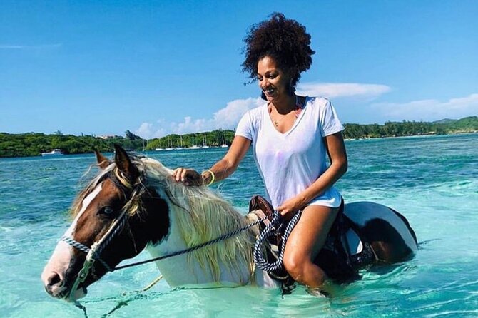 Private Horseback Riding, Swim & Blue Hole Secret Falls - Your day in one picture: horses, drives, and Blue Hole