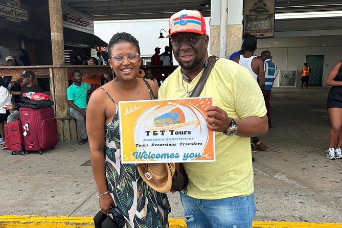 Private Transportation to and from Montego Bay Airports or Hotels - Meet the driver fast: T&T Tours sign and a clear pickup rhythm