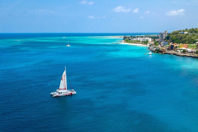 Reggae Catamaran and Snorkeling Open Bar Cruise Montego Bay - Open bar, DJ reggae, and appetizers after you swim