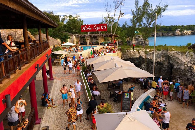 Rick's Café and Seven Mile Beach Private Tour - Seven Mile Beach: calm reef water and easy family fun
