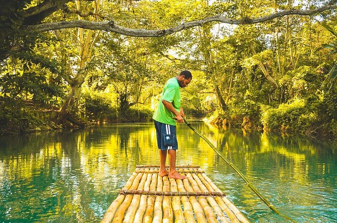 River Rafting in Jamaica - Boarding a traditional bamboo raft with a local guide