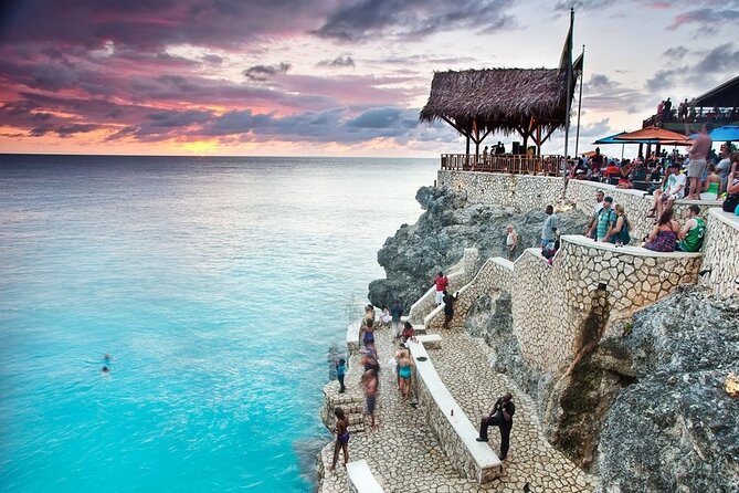 River Rafting with {Limestone Massage} & Ricks Cafe from Montego Bay - Rick’s Cafe: music, food, and cliffside action