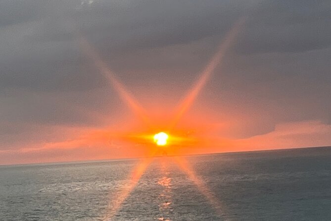 Tour to Negril 7 Miles Beach and Rick’s Cafe from Montego Bay - Rick’s Cafe West End cliffs: sunset views and the cliff jump choice